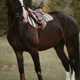 Sixteen Cypress Close Contact Saddle Pad on a bay horse