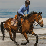 16 Cypress field plaid saddle pad on McKenzie Rollins, equestrian riding on the beach in California. 